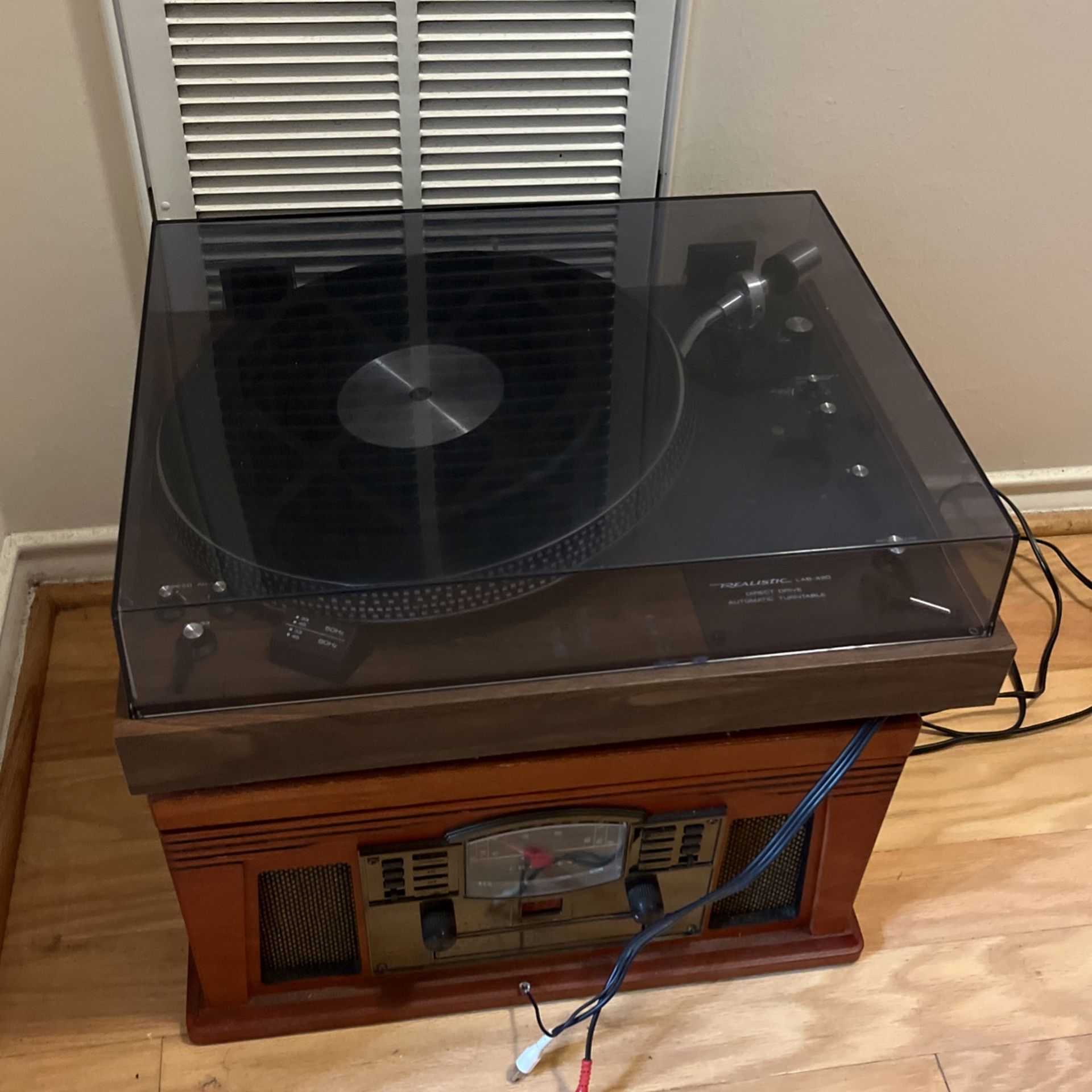 Two Record Vinyl Disc Players with table and cords. vintage music turntable collectable