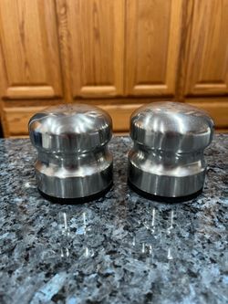 Vintage Danish Mid Century Modern Stainless Steel Pair of Salt & Pepper Shakers.  Color Chrome.  Size approximately 2 3/4 inches tall and 2 3/4 inches