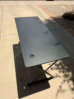 Office table with access holes for cables