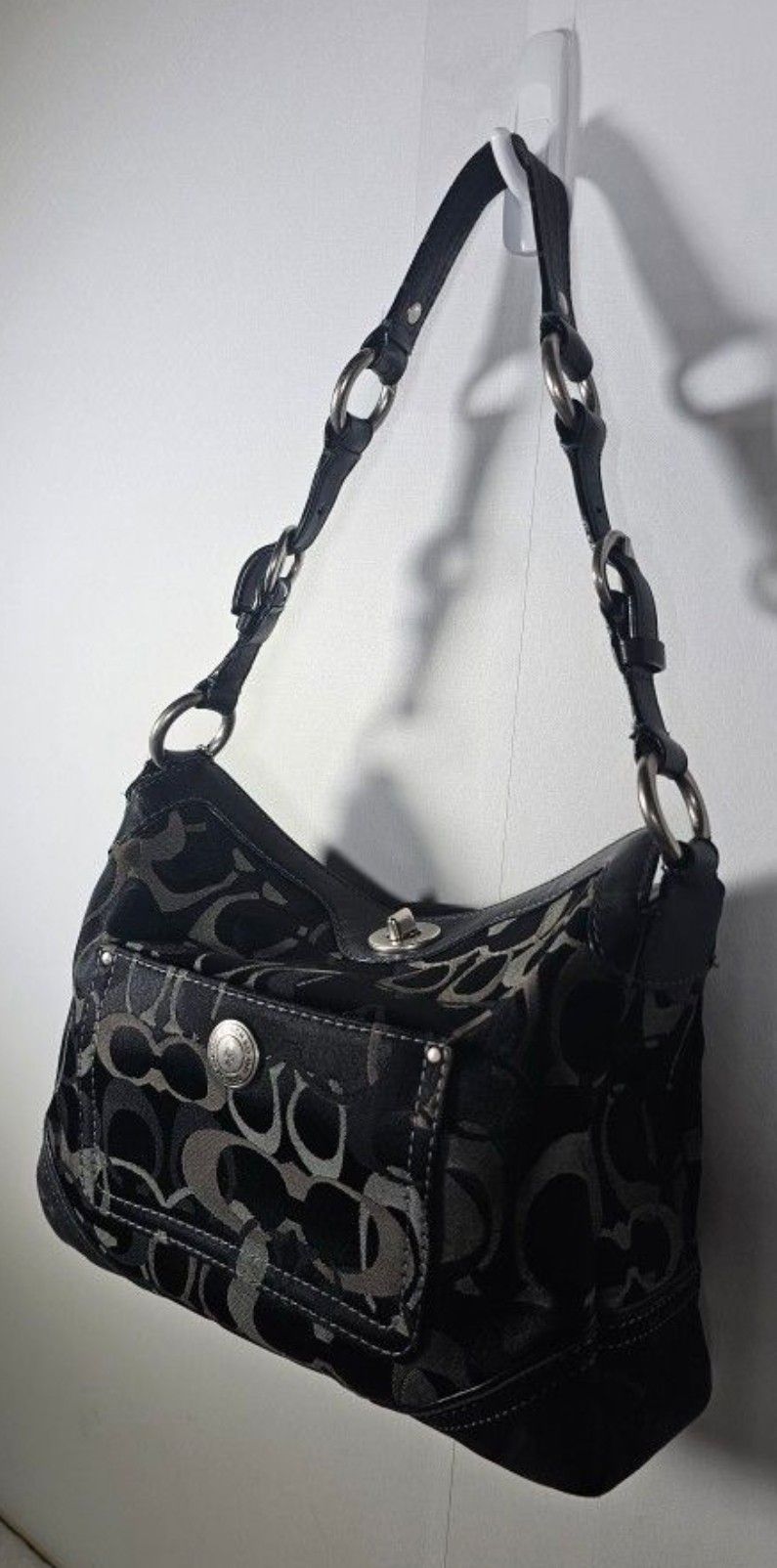 Coach Black Shoulder Bag in Signature Jacquard.