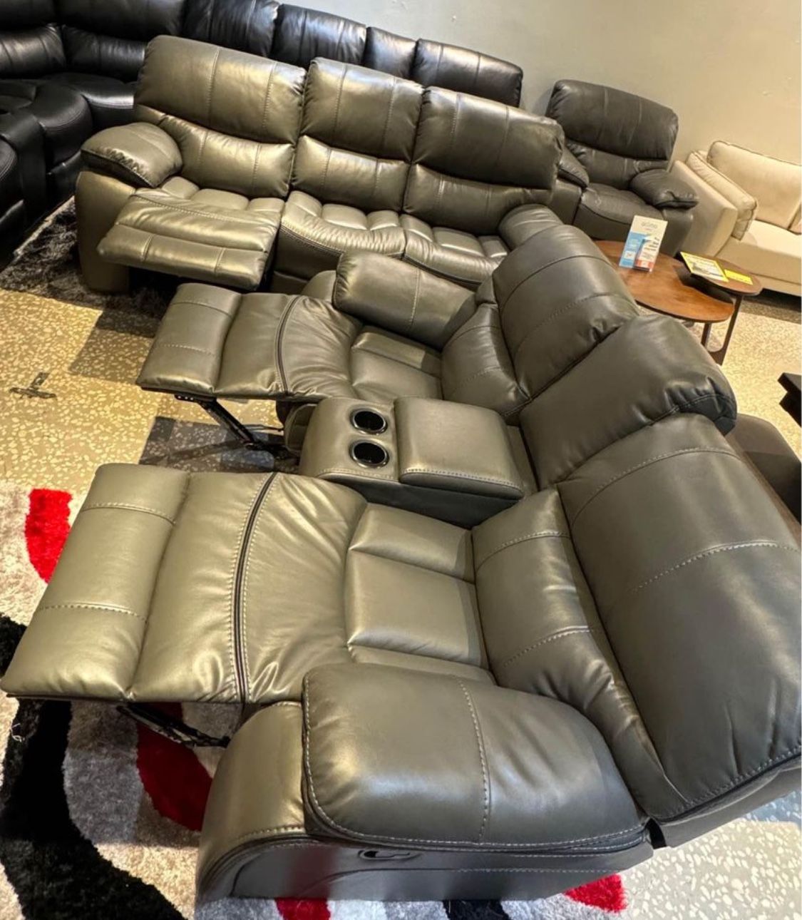 Fall blowout sale. Madrid, gray leather reclining sofa and loveseat set now only $899. Easy finance option. Same day delivery.