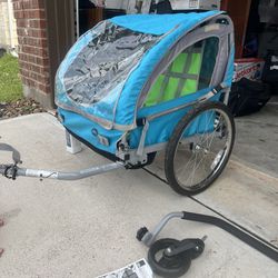 Bell two seater bike trailer with three wheel push option.