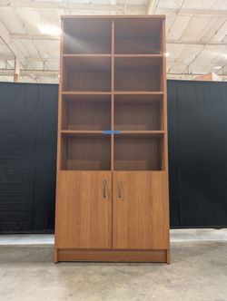 Cherry Wood Tone Multi-Section Bookcase with Lower Cabinet