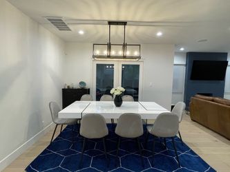 Contemporary Gloss White Dining Table with 8 Velvet Chairs