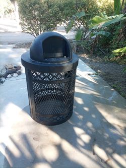 Rubber coated steel trash can housing
