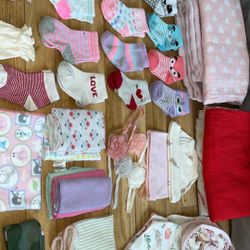 Bunch of babygirl stuff, 3-6 mainly, socks shoes, bibs, bows, washcloths, blankets, everything is in good condition, and some in new never worn, there