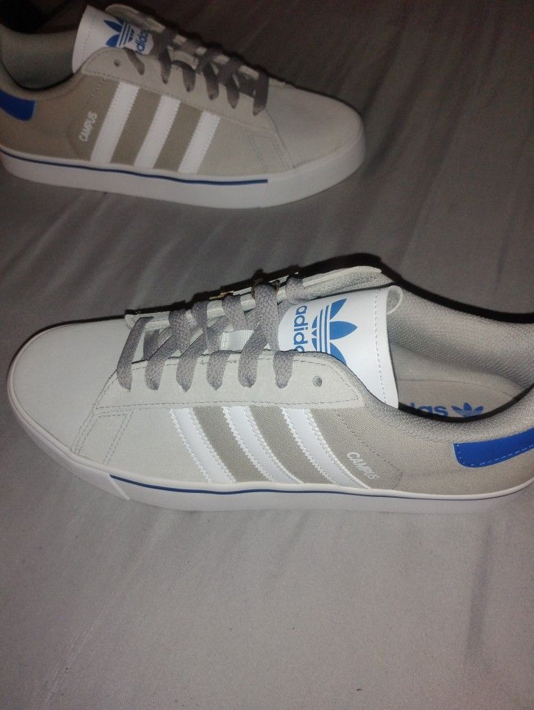 Adidas... Brand New .. Size 10