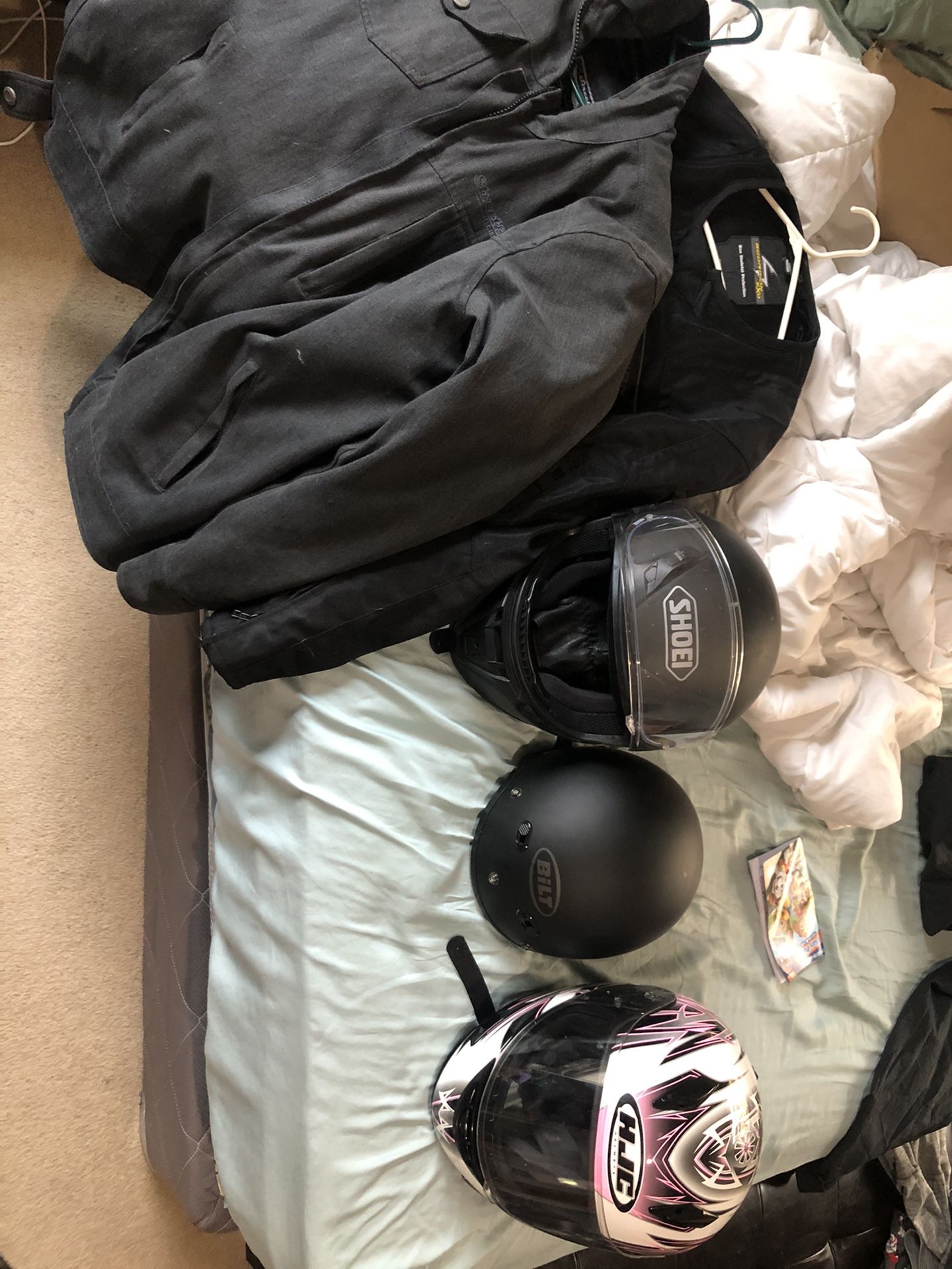 Motorcycle gear, 3 helmets and 2 jackets 100 each