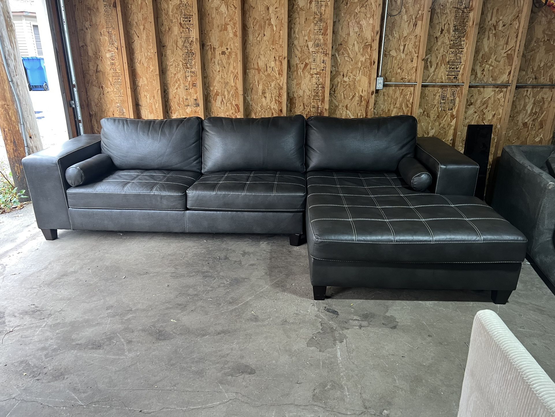FREE DELIVERY - Ashley Furniture Modern Leather Sectional Sofa