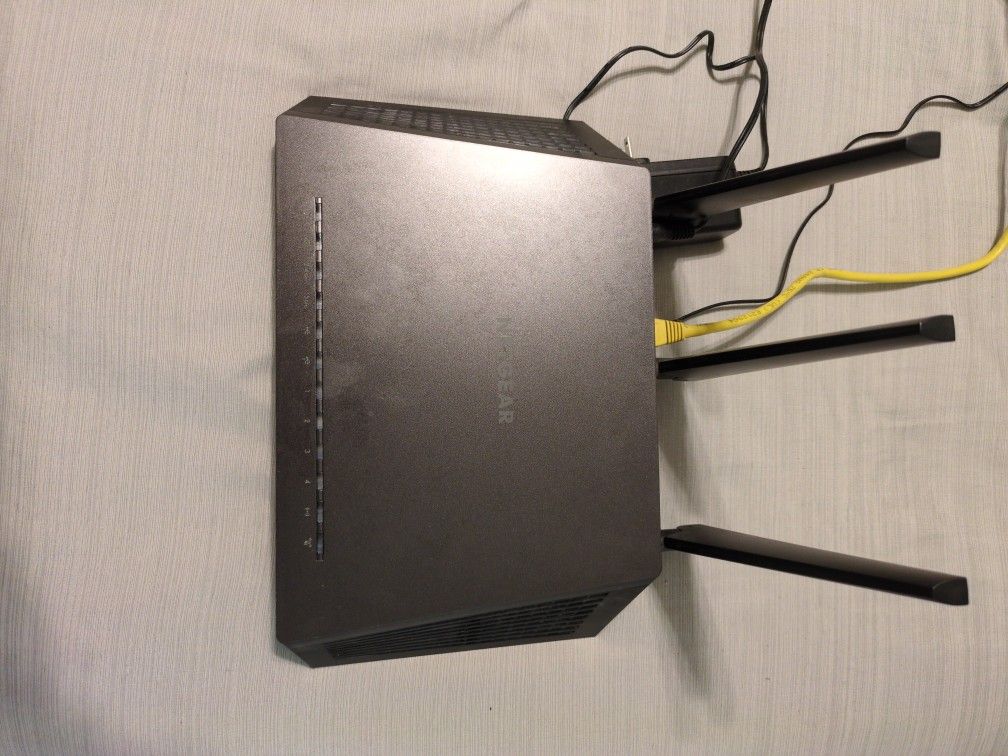 Netgear Nighthawk AC1900 Model R7000 Router and Arris Surfboard SB8200