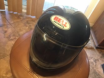 Bell motorcycle helmet sz 7 1/8. Black street moto snell
