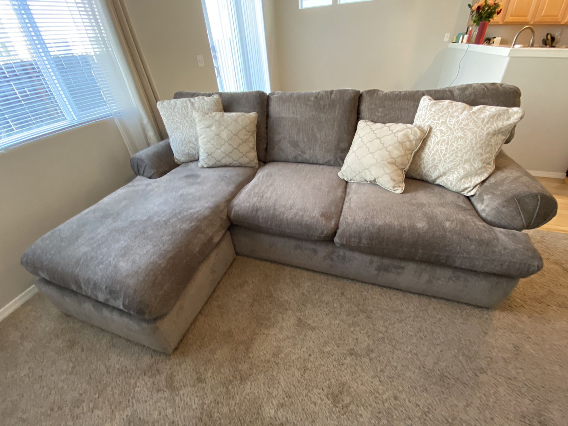 Barely used down feather micro fiber sectional with chaise