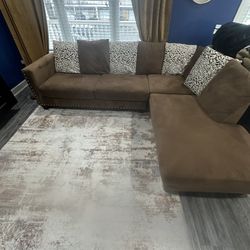 Brown Sectional Sofa with Chaise and Decorative Cushions 