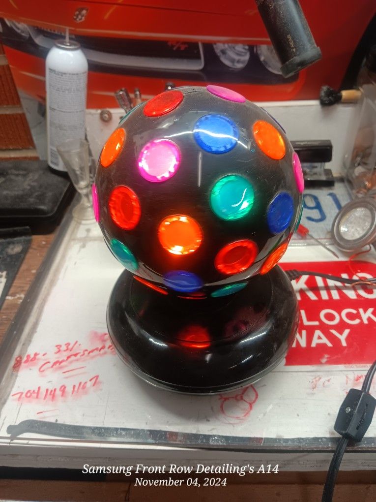 Spinning Disco Ball Lights Up The Room