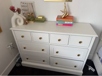 White 8 drawer dresser with gold knobs