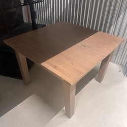 Table no chairs . Taken apart for easy transport solid wood