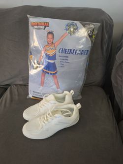 Cheerleader size 10-12 includes tennis shoes (new )