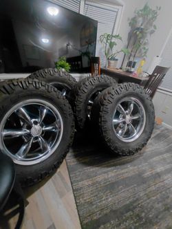 Chevrolet Gmc rims and tires. Super deal.