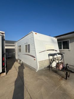 Traila 16x8 the trailer has had its kitchen and bathroom removed it has new flooring a granite countertop a chest of drawers and the upper cabinets it