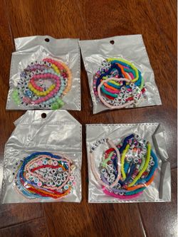 2/4 4 packs of bracelets—brand new.