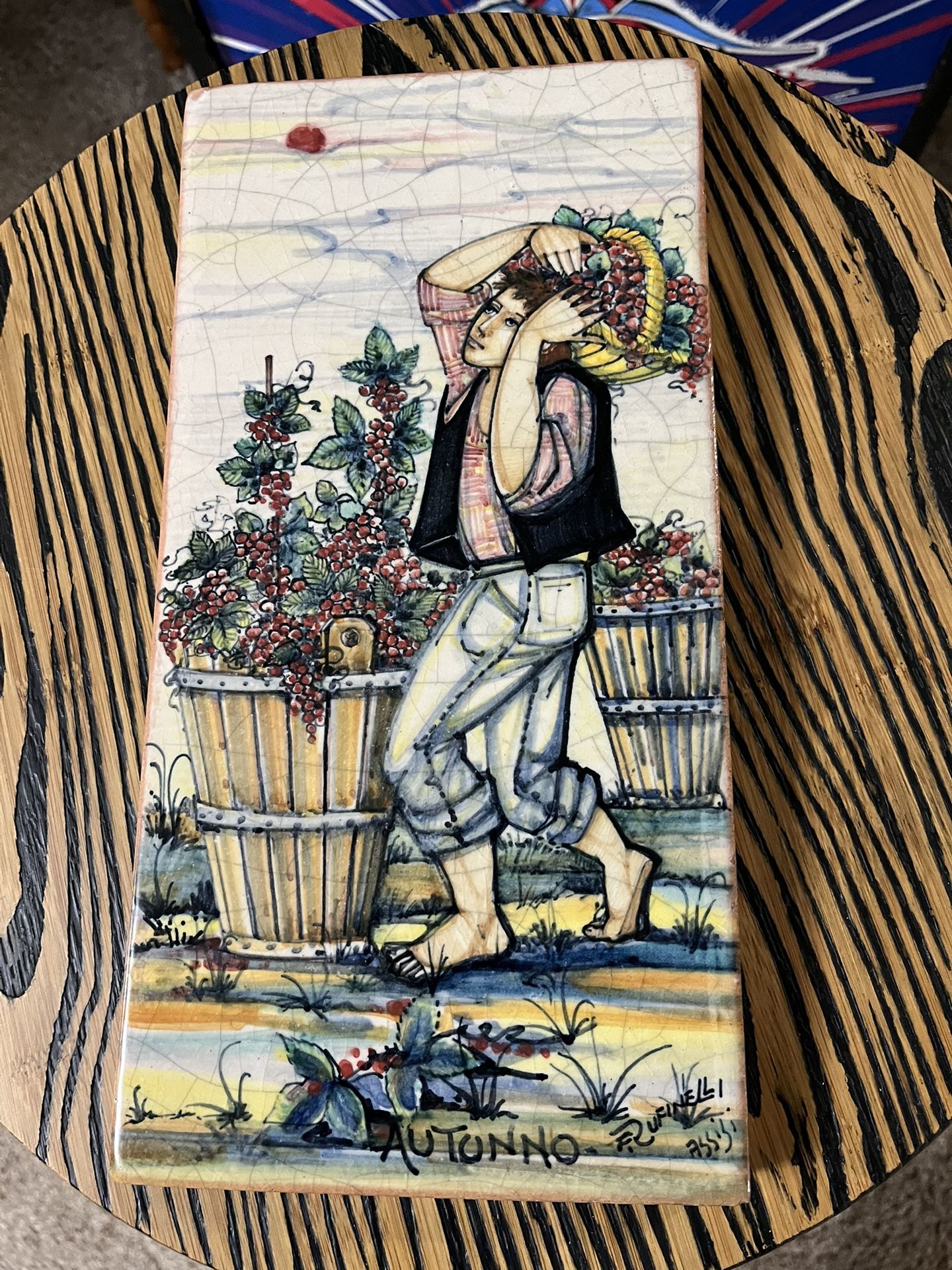 Vintage Hand painted Italian ceramic tile plaque depicting "Autunno" (Autumn) from a Four Seasons series, “Autumn” created by Franco Rufinelli Assisi.