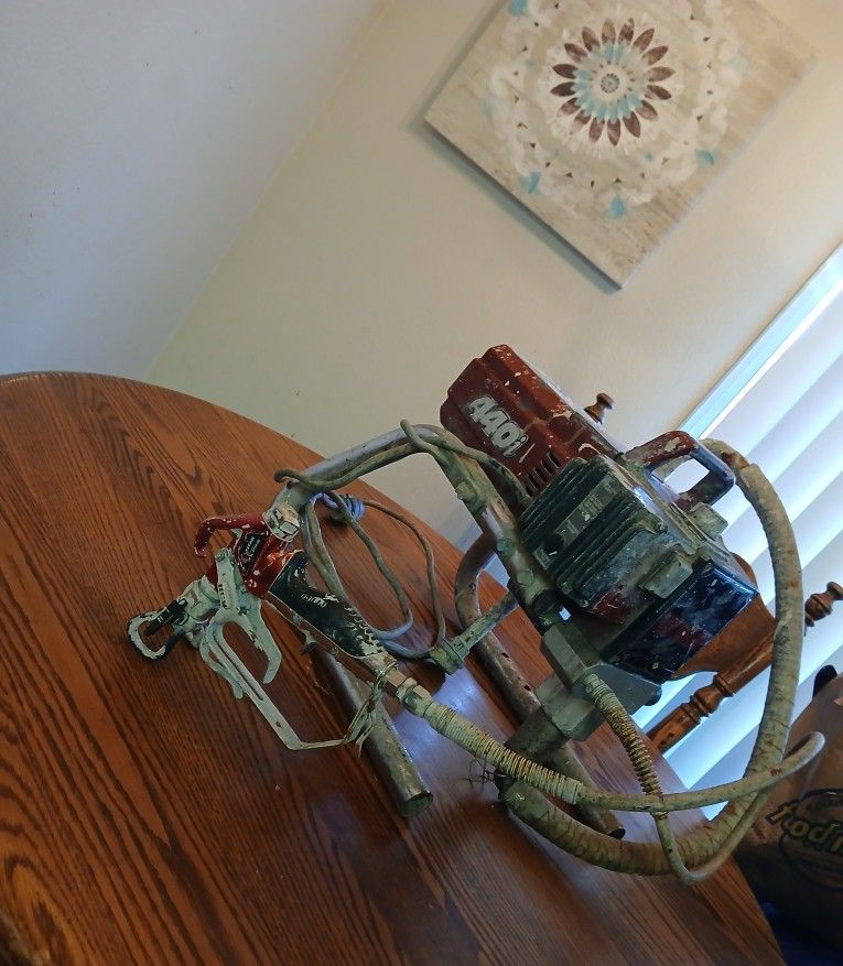 Titan, 440I,red,weighs twenty Pounds 