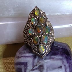 WELO OPAL ELONGATED STERLING RING. SIZE: 6