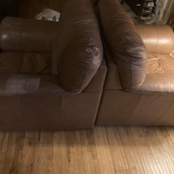 Two Leather Chairs