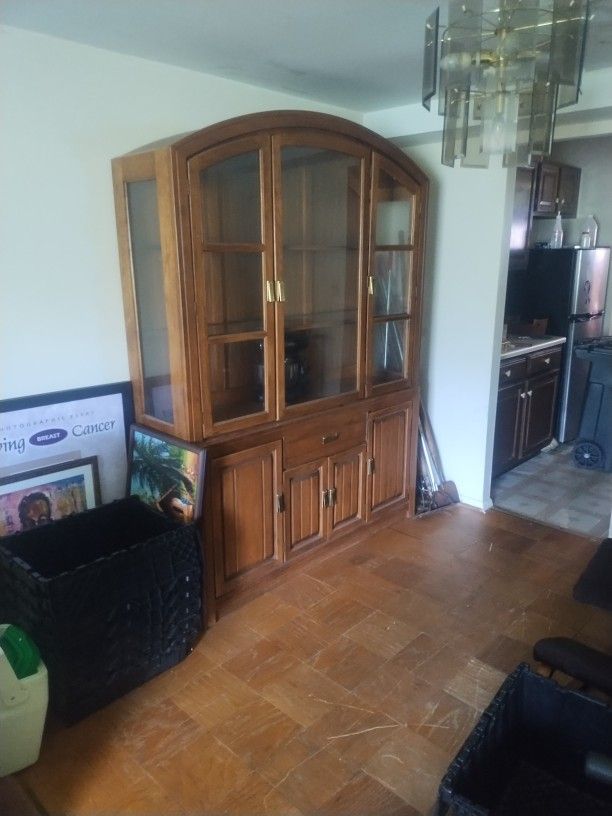 The China Cabinet Has A Table That Match The China Cabinet Is Two Pieces
