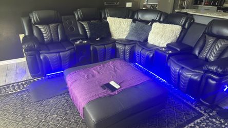 Black leather sectional couch