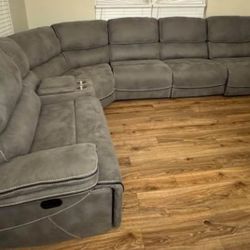 Labor Day sale now. Alejandro gray reclining sectional only $1499. Easy finance option. Same-day delivery
