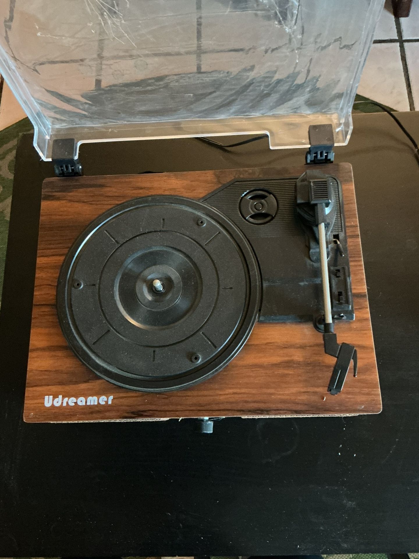 Vinyl Record Player comes with Living Legend by Almost Famous Vinyl