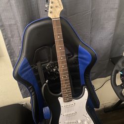 black Fender Squier Stratocaster Electric Guitar