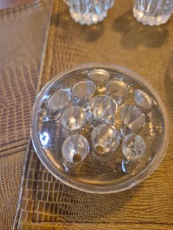 Glass flower frog with 11 holes and clear glass two-part relish tray