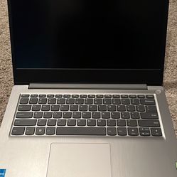 silver Lenovo laptop 