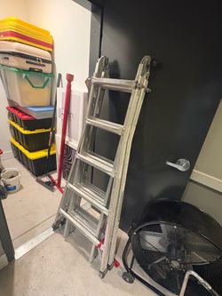 Heavy-duty Werner aluminum multi-position ladder.