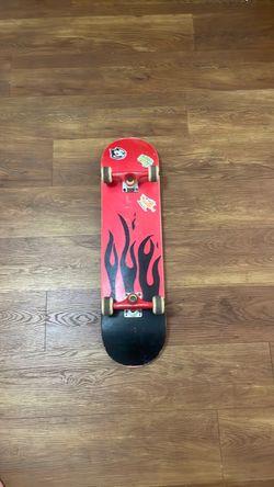Complete Skateboard Red Flame Graphic