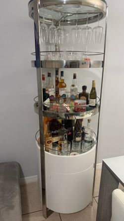 Bar with drawer and cabinet space