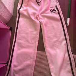 Pink Sweatpants brand new tag size xl but fits medium-large due to stretch and broad cut frame