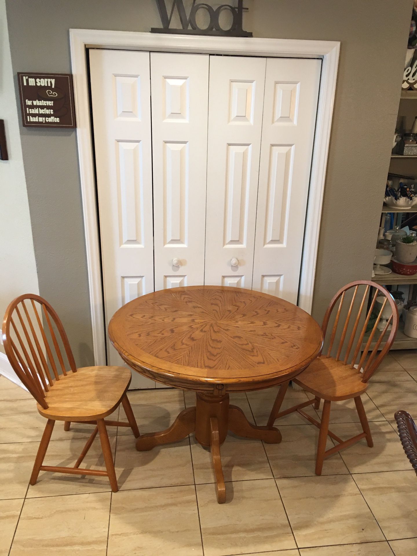 Solid oak table and 2 chairs. Used in good condition. Table size 42” x 42” x 29”