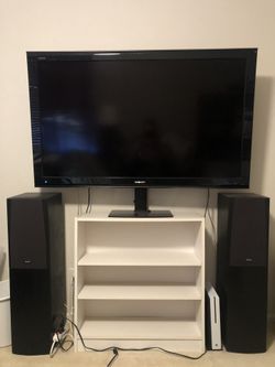 45” SHARP Aquos TV, w/ stand and shelf, plus Speakers
