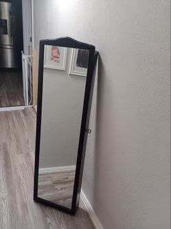 tall black jewelry chest