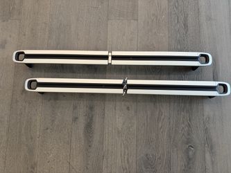 Like New: OEM Rivian R1 Cargo Crossbars with key