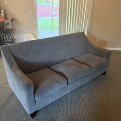 Grey Quilted back couch