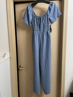 Brand new with tags adorable blue women’s romper size small. 