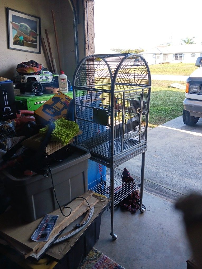 Stand Up Good Condition Bird Cage Woth Wheels And Small Carry Travel Size Good Condition And Toys