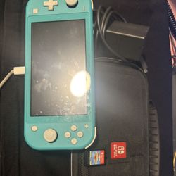 Nintendo Light With Screen Protector Also With Case Charger And A Sonic Game 