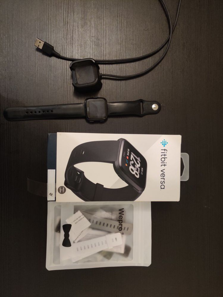 Fitbit Versa fitness Smart Watch + charger + addtional bands