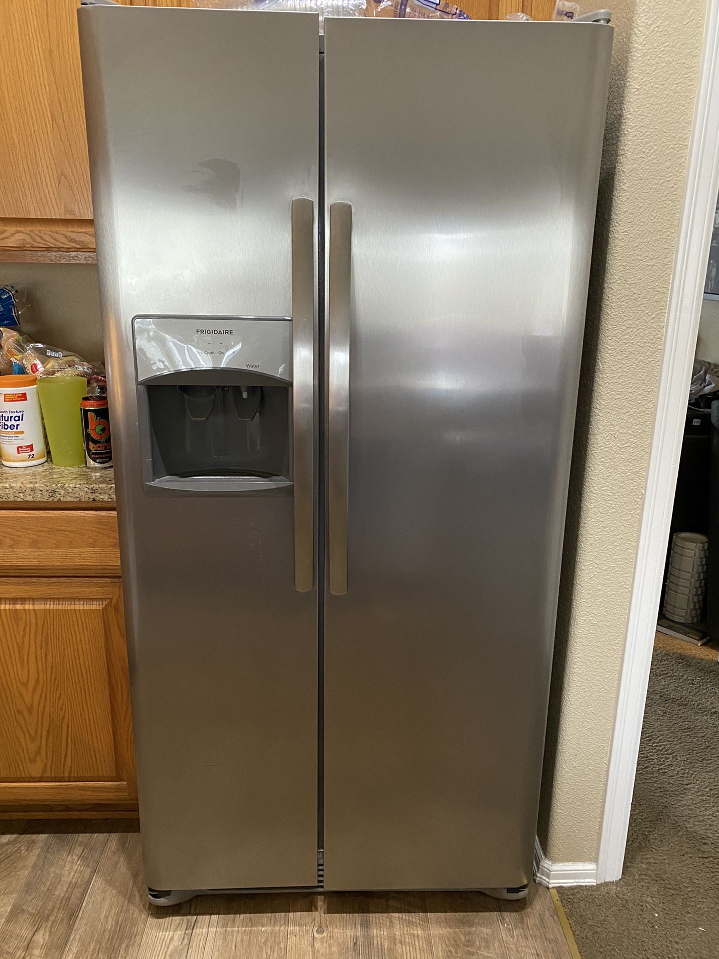 Frigidaire 25.5 side by side refrigerator 16 months old.