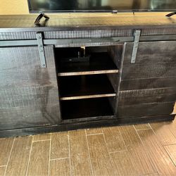 Barn door style stand